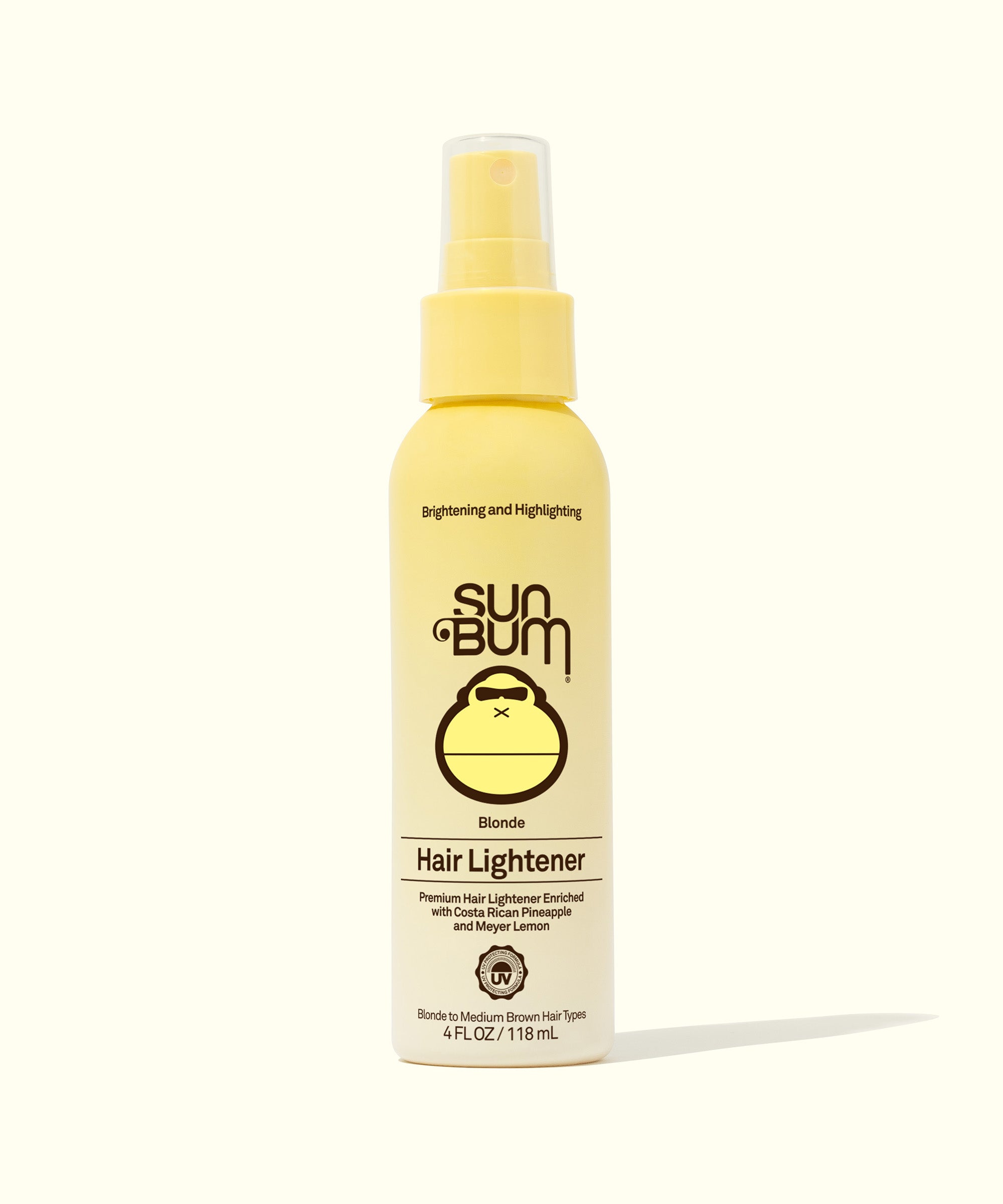 Yellow bottle of Sun Bum Blonde Hair Lightener spray, infused with Costa Rican Pineapples and Meyer Lemons for natural sun highlighting. Sun Bum,
