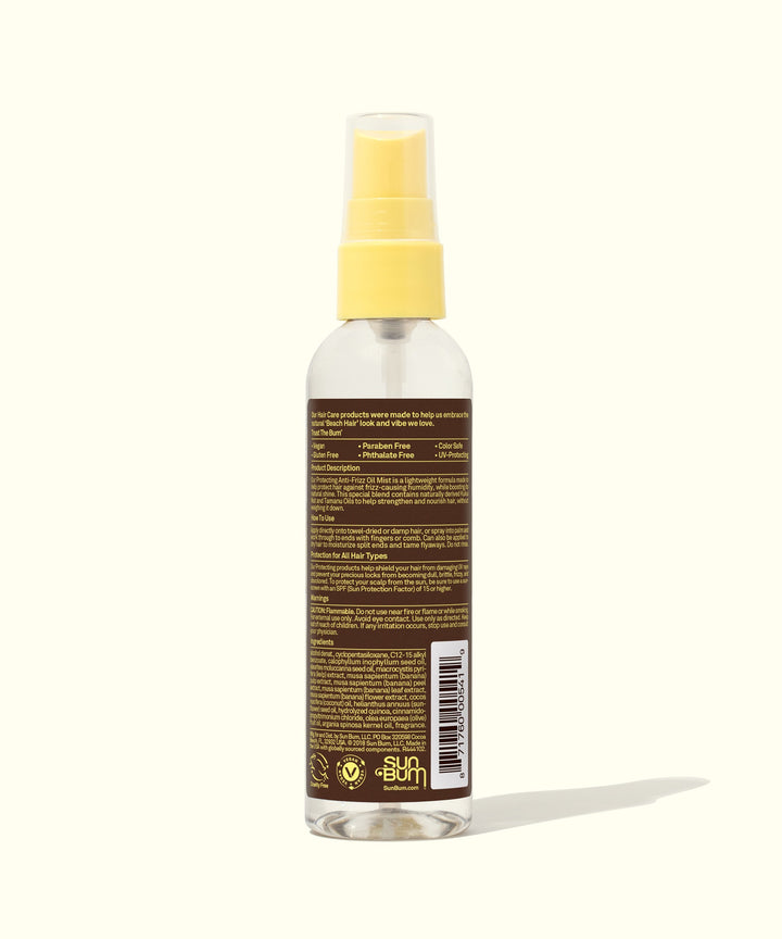 Back view of the Anti-Frizz Oil Mist bottle with yellow cap and product information on label. Sun Bum,