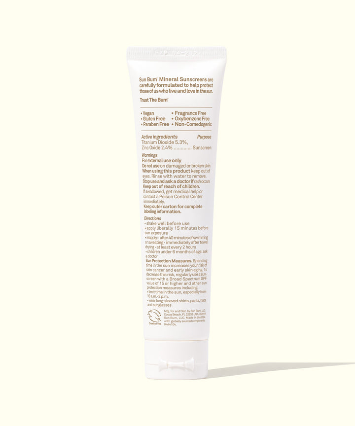 Back view of a tube of Mineral SPF 30 Sunscreen Face Lotion, showcasing the ingredients and features like Fragrance Free, non-tinted, lightweight, vegan formula by Sun Bum.