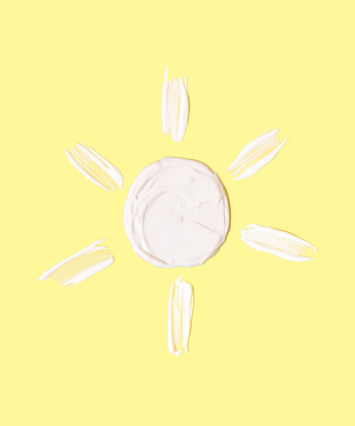 Daily Sunscreen Moisturizer SPF 30 forming a sun shape with a yellow background. Keep your skin hydrated and protected with antioxidant-rich Banana, Wild Rosella, and Niacinamide. Sun Bum.