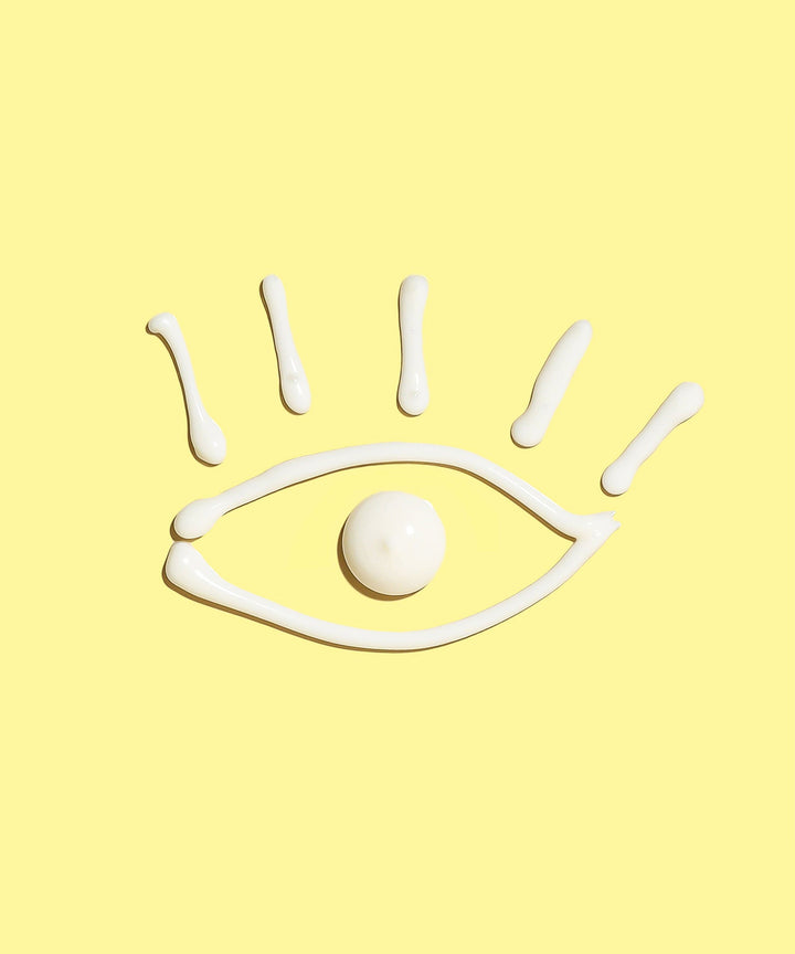 Eye-shaped cream design on yellow background, promoting the hydrating and reviving effects of Vitamin C enriched Rambutan and Niacinamide for tired and puffy eyes, Sun Bum