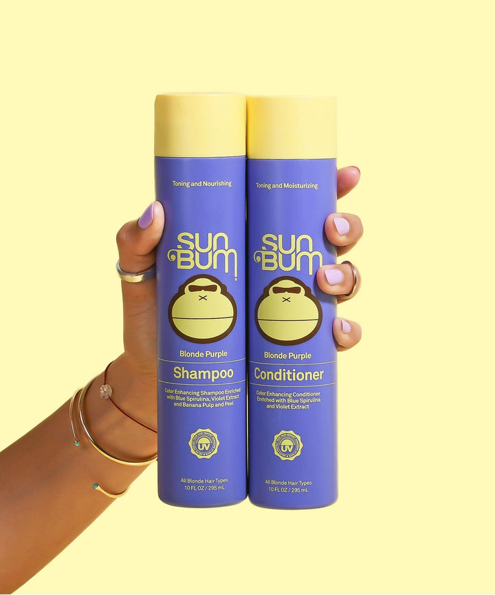 Blonde Purple Conditioner - the ultimate secret for cooling warm tones in blonde and brunette hair, shown alongside its matching shampoo. Sun Bum
